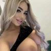 Sandra – blond, mit dicken Silikon Titten. Bild